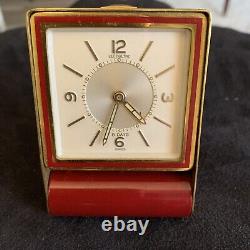 Horloge de voyage vintage Jaeger LeCoultre en bordeaux avec alarme 8 jours